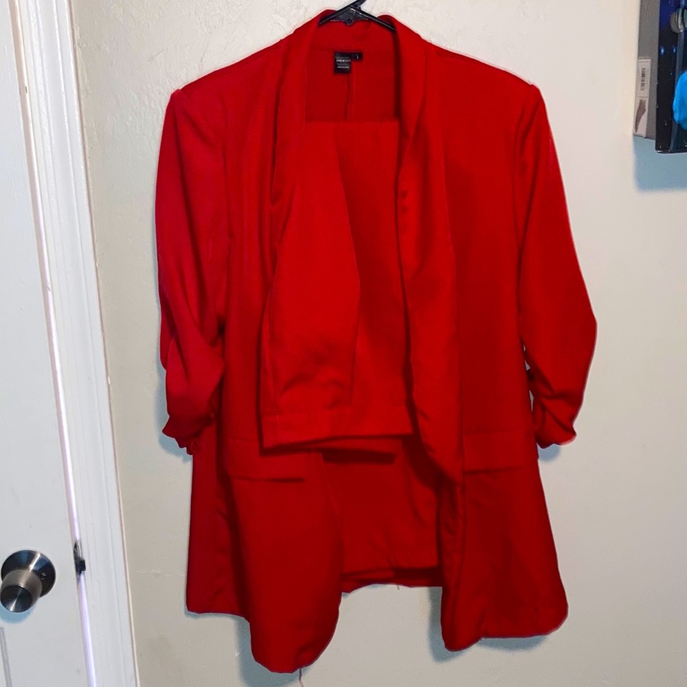 Red blazer and slacks
